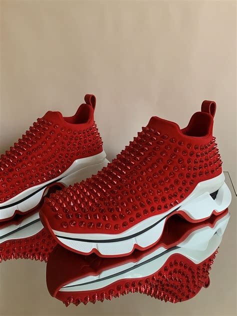 louis vuitton red sole trainers|Louis Vuitton sock trainers.